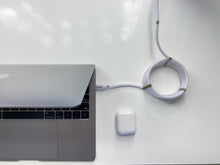 Load image into Gallery viewer, Coily Cables coiled on a desk
